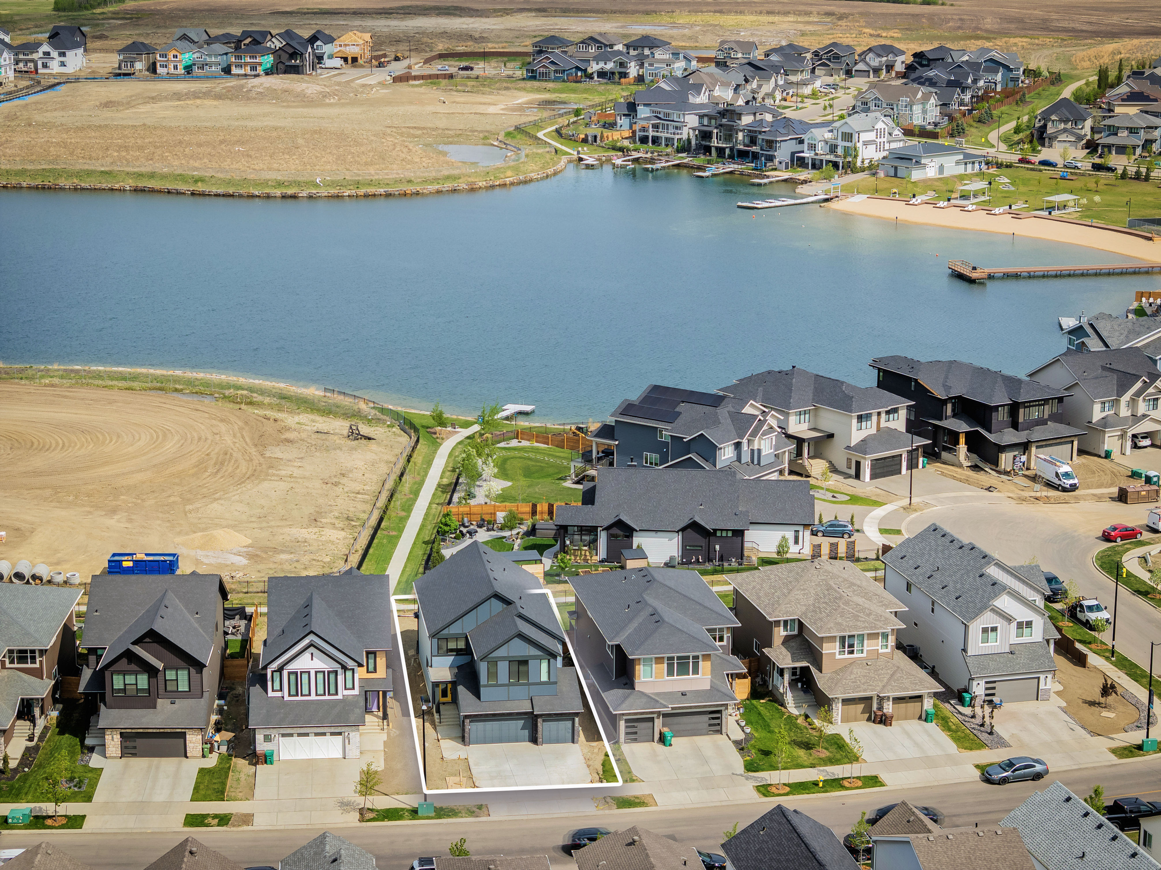 Aerial view of 289 Jensen Lakes Blvd in St. Albert with homes for sale by Holland and Associates Real Estate.